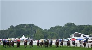Jockey James Doyle rides Naval Crown (R) to victory in the Platinum Jubilee Stakes on the final day of the Royal Ascot horse racing meeting, in Ascot, west of London on June 18, 2022. (Photo by JUSTIN TALLIS / AFP) (Photo by JUSTIN TALLIS/AFP via Getty Images)