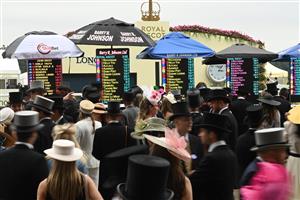 ASCOT, ENGLAND - JUNE 18: Racegoers outside the betting stands during Royal Ascot 2022 at Ascot Racecourse on June 18, 2022 in Ascot, England. (Photo by Eamonn M. McCormack/Getty Images for Ascot Racecourse)