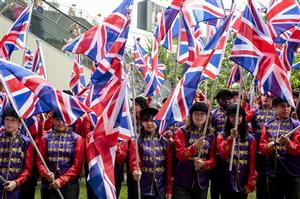 ASCOT, ENGLAND - JUNE 18: School children dressed in The Queen