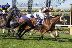 MELBOURNE, AUSTRALIA - JUNE 18: Billy Egan riding Nasraawy winning Race 2, the Country Racing Victoria Handicap, during Melbourne Racing at Flemington Racecourse on June 18, 2022 in Melbourne, Australia. (Photo by Vince Caligiuri/Getty Images)