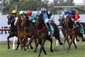 SYDNEY, AUSTRALIA - JUNE 18: Reece Jones on Don'tforgetmonica wins race 2, the TAB Highway Handicap during Sydney Racing at Rosehill Gardens on June 18, 2022 in Sydney, Australia. (Getty)
