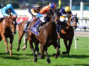 MELBOURNE, AUSTRALIA - JUNE 18: Beau Mertens riding Grinzinger Bishop winning Race 3, the Rod Johnson Handicap, during Melbourne Racing at Flemington Racecourse on June 18, 2022 in Melbourne, Australia. (Photo by Vince Caligiuri/Getty Images)