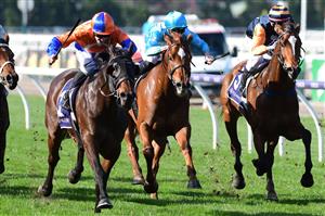 MELBOURNE, AUSTRALIA - JUNE 18: Beau Mertens riding Grinzinger Bishop winning Race 3, the Rod Johnson Handicap, during Melbourne Racing at Flemington Racecourse on June 18, 2022 in Melbourne, Australia. (Photo by Vince Caligiuri/Getty Images)