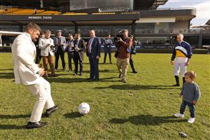 SYDNEY, AUSTRALIA - JUNE 18: Socceroos Captain and goalkeeper Mat Ryan kicks a ball with Hunter Avdulla, son of Brenton Avdulla (R), during Sydney Racing at Rosehill Gardens on June 18, 2022 in Sydney, Australia. (Photo by Mark Evans/Getty Images)