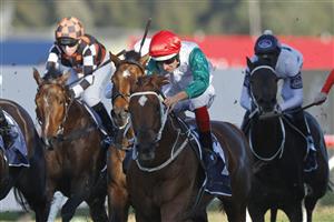 SYDNEY, AUSTRALIA - JUNE 18: Hugh Bowman on Wicklow wins race 8 the Warren Woodcock Senior Handicap during Sydney Racing at Rosehill Gardens on June 18, 2022 in Sydney, Australia. (Photo by Mark Evans/Getty Images)