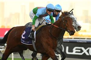 MELBOURNE, AUSTRALIA - JUNE 18: Jarrod Fry riding Tuvalu winning Race 8, the The David Bourke, during Melbourne Racing at Flemington Racecourse on June 18, 2022 in Melbourne, Australia. (Photo by Vince Caligiuri/Getty Images)