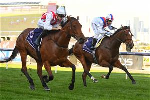 MELBOURNE, AUSTRALIA - JUNE 18: Jordan Childs riding Passive Aggressive defeats Brett Prebble riding Star Patrol in Race 5, the A.r. Creswick Stakes, during Melbourne Racing at Flemington Racecourse on June 18, 2022 in Melbourne, Australia. (Photo by Vince Caligiuri/Getty Images)