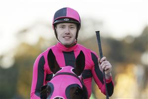 SYDNEY, AUSTRALIA - JUNE 18: Rory Hutchings on Titanium Power returns to scale after winning race 10 the Barry Cook Handicap during Sydney Racing at Rosehill Gardens on June 18, 2022 in Sydney, Australia. (Photo by Mark Evans/Getty Images)