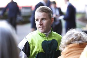 SYDNEY, AUSTRALIA - JUNE 18: Tommy Berry walks towards his family after winning race 9 the Robert Patricks Handicap on Bella Rouge during Sydney Racing at Rosehill Gardens on June 18, 2022 in Sydney, Australia. (Photo by Mark Evans/Getty Images)