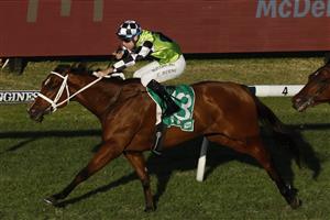 SYDNEY, AUSTRALIA - JUNE 18: Tommy Berry on Bella Rouge wins race 9 the Robert Patricks Handicap during Sydney Racing at Rosehill Gardens on June 18, 2022 in Sydney, Australia. (Photo by Mark Evans/Getty Images)