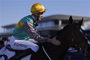 SYDNEY, AUSTRALIA - JULY 09: Sam Clipperton on La Chevalee returns to scale after winning race 4 the Chandon Handicap during Sydney Racing at Royal Randwick Racecourse on July 09, 2022 in Sydney, Australia. (Photo by Mark Evans/Getty Images)