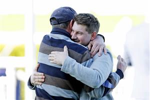 SYDNEY, AUSTRALIA - JULY 09: Trainer Matthew Kelley (R) is hugged after his first city winner with I've Bean Tryin' winning race 2, the TAB Highway Handicap during Sydney Racing at Royal Randwick Racecourse on July 09, 2022 in Sydney, Australia. (Photo by Mark Evans/Getty Images)