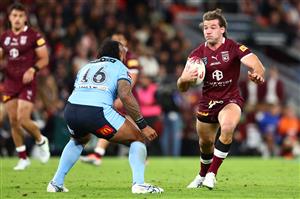 BRISBANE, AUSTRALIA - JULY 13: Patrick Carrigan of the Maroons runs the ball during game three of the State of Origin Series between the Queensland Maroons and the New South Wales Blues at Suncorp Stadium on July 13, 2022, in Brisbane, Australia. (Photo by Chris Hyde/Getty Images)