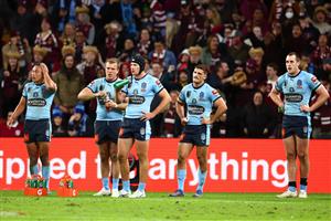 BRISBANE, AUSTRALIA - JULY 13: Blues players look on after a Maroons try during game three of the State of Origin Series between the Queensland Maroons and the New South Wales Blues at Suncorp Stadium on July 13, 2022, in Brisbane, Australia. (Photo by Chris Hyde/Getty Images)
