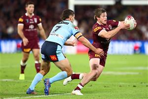 BRISBANE, AUSTRALIA - JULY 13: Harry Grant of the Maroons runs the ball during game three of the State of Origin Series between the Queensland Maroons and the New South Wales Blues at Suncorp Stadium on July 13, 2022, in Brisbane, Australia. (Photo by Chris Hyde/Getty Images)