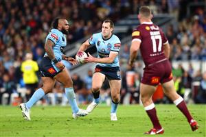 BRISBANE, AUSTRALIA - JULY 13: Isaah Yeo of the Blues runs the ball during game three of the State of Origin Series between the Queensland Maroons and the New South Wales Blues at Suncorp Stadium on July 13, 2022, in Brisbane, Australia. (Photo by Chris Hyde/Getty Images)