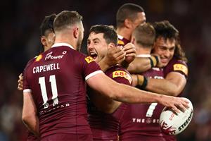 BRISBANE, AUSTRALIA - JULY 13: Ben Hunt of the Maroons celebrates with team mates after winning game three of the State of Origin Series between the Queensland Maroons and the New South Wales Blues at Suncorp Stadium on July 13, 2022, in Brisbane, Australia. (Photo by Chris Hyde/Getty Images)