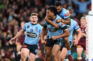 BRISBANE, AUSTRALIA - JULY 13: Jacob Saifiti of the Blues celebrates with teammates after scoring a try during game three of the State of Origin Series between the Queensland Maroons and the New South Wales Blues at Suncorp Stadium on July 13, 2022 in Brisbane, Australia. (Photo by Bradley Kanaris/Getty Images)