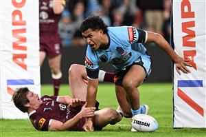 BRISBANE, AUSTRALIA - JULY 13: Jacob Saifiti of the Blues celebrates scoring a try during game three of the State of Origin Series between the Queensland Maroons and the New South Wales Blues at Suncorp Stadium on July 13, 2022 in Brisbane, Australia. (Photo by Bradley Kanaris/Getty Images)