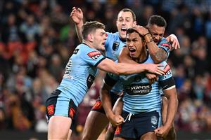 BRISBANE, AUSTRALIA - JULY 13: Jacob Saifiti of the Blues celebrates with teammates after scoring a try during game three of the State of Origin Series between the Queensland Maroons and the New South Wales Blues at Suncorp Stadium on July 13, 2022 in Brisbane, Australia. (Photo by Bradley Kanaris/Getty Images)