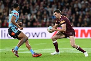 BRISBANE, AUSTRALIA - JULY 13: Corey Oates of the Maroons runs the ball during game three of the State of Origin Series between the Queensland Maroons and the New South Wales Blues at Suncorp Stadium on July 13, 2022 in Brisbane, Australia. (Photo by Bradley Kanaris/Getty Images)