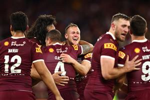 BRISBANE, AUSTRALIA - JULY 13: Daly Cherry-Evans of the Maroons celebrates with team matesafter winning game three of the State of Origin Series between the Queensland Maroons and the New South Wales Blues at Suncorp Stadium on July 13, 2022, in Brisbane, Australia. (Photo by Chris Hyde/Getty Images)