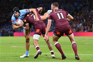 BRISBANE, AUSTRALIA - JULY 13: Matt Burton of the Blues is tackled by Dane Gagai of the Maroons during game three of the State of Origin Series between the Queensland Maroons and the New South Wales Blues at Suncorp Stadium on July 13, 2022 in Brisbane, Australia. (Photo by Bradley Kanaris/Getty Images)