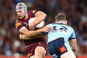BRISBANE, AUSTRALIA - JULY 13: Kalyn Ponga of the Maroons is tackled during game three of the State of Origin Series between the Queensland Maroons and the New South Wales Blues at Suncorp Stadium on July 13, 2022, in Brisbane, Australia. (Photo by Chris Hyde/Getty Images)