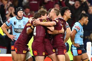 BRISBANE, AUSTRALIA - JULY 13: Kurt Capewell of the Maroons celebrates with team mates after scoring a try during game three of the State of Origin Series between the Queensland Maroons and the New South Wales Blues at Suncorp Stadium on July 13, 2022, in Brisbane, Australia. (Photo by Chris Hyde/Getty Images)