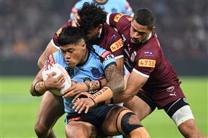BRISBANE, AUSTRALIA - JULY 13: Brian To’o of the Blues is tackled during game three of the State of Origin Series between the Queensland Maroons and the New South Wales Blues at Suncorp Stadium on July 13, 2022 in Brisbane, Australia. (Photo by Bradley Kanaris/Getty Images)