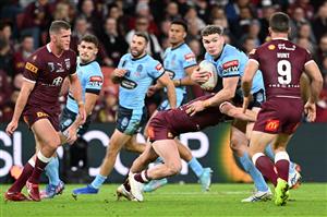 BRISBANE, AUSTRALIA - JULY 13: Liam Martin of the Blues is tackled during game three of the State of Origin Series between the Queensland Maroons and the New South Wales Blues at Suncorp Stadium on July 13, 2022 in Brisbane, Australia. (Photo by Bradley Kanaris/Getty Images)