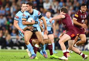 BRISBANE, AUSTRALIA - JULY 13: Nathan Cleary of the Blues is tackled during game three of the State of Origin Series between the Queensland Maroons and the New South Wales Blues at Suncorp Stadium on July 13, 2022, in Brisbane, Australia. (Photo by Chris Hyde/Getty Images)