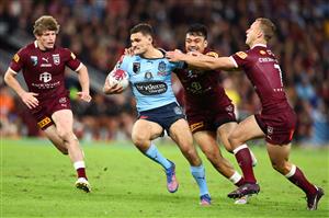 BRISBANE, AUSTRALIA - JULY 13: Nathan Cleary of the Bluesis tackled during game three of the State of Origin Series between the Queensland Maroons and the New South Wales Blues at Suncorp Stadium on July 13, 2022, in Brisbane, Australia. (Photo by Chris Hyde/Getty Images)