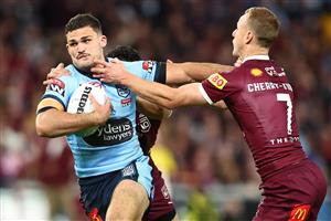 BRISBANE, AUSTRALIA - JULY 13: Nathan Cleary of the Bluesis tackled during game three of the State of Origin Series between the Queensland Maroons and the New South Wales Blues at Suncorp Stadium on July 13, 2022, in Brisbane, Australia. (Photo by Chris Hyde/Getty Images)
