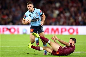 BRISBANE, AUSTRALIA - JULY 13: Nathan Cleary of the Blues fends off Ben Hunt of the Maroons during game three of the State of Origin Series between the Queensland Maroons and the New South Wales Blues at Suncorp Stadium on July 13, 2022, in Brisbane, Australia. (Photo by Chris Hyde/Getty Images)