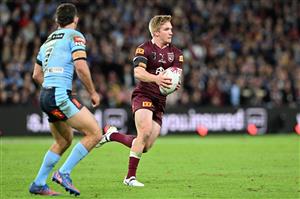 BRISBANE, AUSTRALIA - JULY 13: Tom Dearden of the Maroons runs the ball during game three of the State of Origin Series between the Queensland Maroons and the New South Wales Blues at Suncorp Stadium on July 13, 2022 in Brisbane, Australia. (Photo by Bradley Kanaris/Getty Images)