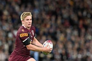 BRISBANE, AUSTRALIA - JULY 13: Tom Dearden of the Maroons runs the ball during game three of the State of Origin Series between the Queensland Maroons and the New South Wales Blues at Suncorp Stadium on July 13, 2022 in Brisbane, Australia. (Photo by Bradley Kanaris/Getty Images)