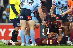 BRISBANE, AUSTRALIA - JULY 13: Selwyn Cobbo of the Maroons is attended to by Dane Gagai of the Maroons after a tackle during game three of the State of Origin Series between the Queensland Maroons and the New South Wales Blues at Suncorp Stadium on July 13, 2022, in Brisbane, Australia. (Photo by Chris Hyde/Getty Images)