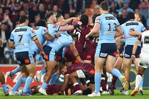BRISBANE, AUSTRALIA - JULY 13: Selwyn Cobbo of the Maroons is attended to by Dane Gagai of the Maroons after a tackle during game three of the State of Origin Series between the Queensland Maroons and the New South Wales Blues at Suncorp Stadium on July 13, 2022, in Brisbane, Australia. (Photo by Chris Hyde/Getty Images)