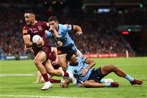 BRISBANE, AUSTRALIA - JULY 13: Valentine Holmes of the Maroons scores a try during game three of the State of Origin Series between the Queensland Maroons and the New South Wales Blues at Suncorp Stadium on July 13, 2022, in Brisbane, Australia. (Photo by Chris Hyde/Getty Images)