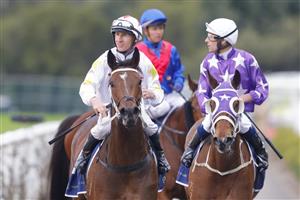 SYDNEY, AUSTRALIA - JULY 16: William Pike (L) on Frumos returns to scale after winning race 9 the China Horse Club Handicap during Sydney Racing at Rosehill Gardens on July 16, 2022 in Sydney, Australia. (Photo by Jenny Evans/Getty Images)