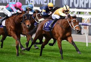 MELBOURNE, AUSTRALIA - JULY 16: Beau Mertens riding Thalassophile winning Race 2, the Ken Cox Handicap, during Melbourne Racing at Flemington Racecourse on July 16, 2022 in Melbourne, Australia. (Photo by Vince Caligiuri/Getty Images)