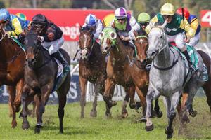 SYDNEY, AUSTRALIA - JULY 16: Brenton Avdulla (black colours) on So Country wins race 2 the Tab Highway Handicap during Sydney Racing at Rosehill Gardens on July 16, 2022 in Sydney, Australia. (Photo by Jenny Evans/Getty Images)