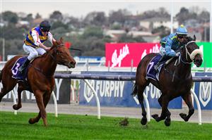 MELBOURNE, AUSTRALIA - JULY 16: Jamie Kah riding Daytona Bay winning Race 8, the K.a Morrison Handicap, during Melbourne Racing at Flemington Racecourse on July 16, 2022 in Melbourne, Australia. (Photo by Vince Caligiuri/Getty Images)