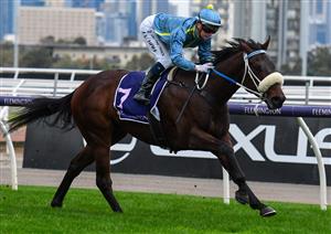 MELBOURNE, AUSTRALIA - JULY 16: Jamie Kah riding Daytona Bay winning Race 8, the K.a Morrison Handicap, during Melbourne Racing at Flemington Racecourse on July 16, 2022 in Melbourne, Australia. (Photo by Vince Caligiuri/Getty Images)