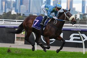 MELBOURNE, AUSTRALIA - JULY 16: Jamie Kah riding Daytona Bay winning Race 8, the K.a Morrison Handicap, during Melbourne Racing at Flemington Racecourse on July 16, 2022 in Melbourne, Australia. (Photo by Vince Caligiuri/Getty Images)