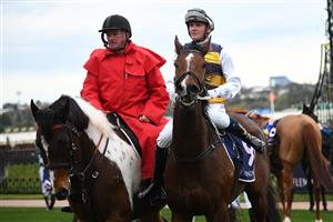 MELBOURNE, AUSTRALIA - JULY 16: Jamie Kah riding Hezashocka winning Race 7, the Vrc Members Handicap, during Melbourne Racing at Flemington Racecourse on July 16, 2022 in Melbourne, Australia. (Photo by Vince Caligiuri/Getty Images)