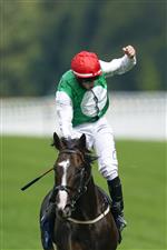 ASCOT, ENGLAND - JULY 23: PJ McDonald celebrates as he rides Pyledriver to win The King George VI And Queen Elizabeth Qipco Stakes at Ascot Racecourse on July 23, 2022 in Ascot, England. (Photo by Alan Crowhurst/Getty Images)