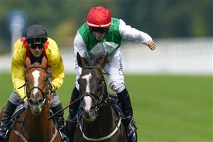 ASCOT, ENGLAND - JULY 23: PJ McDonald celebrates as he rides Pyledriver to win The King George VI And Queen Elizabeth Qipco Stakes at Ascot Racecourse on July 23, 2022 in Ascot, England. (Photo by Alan Crowhurst/Getty Images)