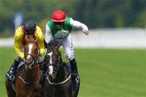ASCOT, ENGLAND - JULY 23: PJ McDonald celebrates as he rides Pyledriver to win The King George VI And Queen Elizabeth Qipco Stakes at Ascot Racecourse on July 23, 2022 in Ascot, England. (Photo by Alan Crowhurst/Getty Images)